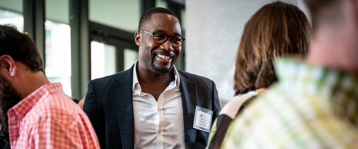 drexel lebow executive dba alumni attend a networking event