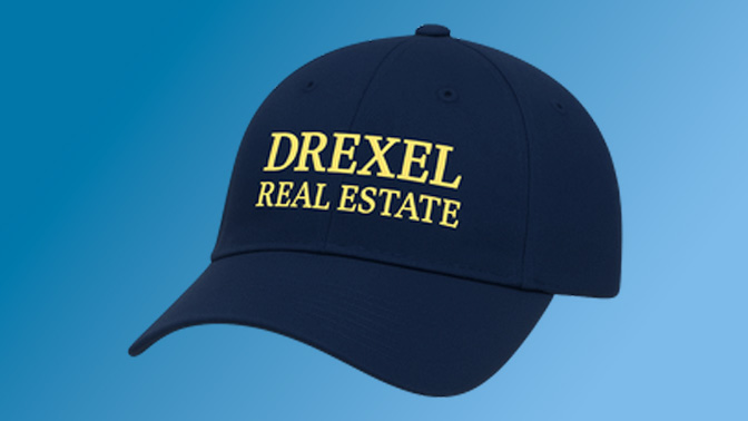 a ballcap adorned with the drexel university henderson real estate institute logo